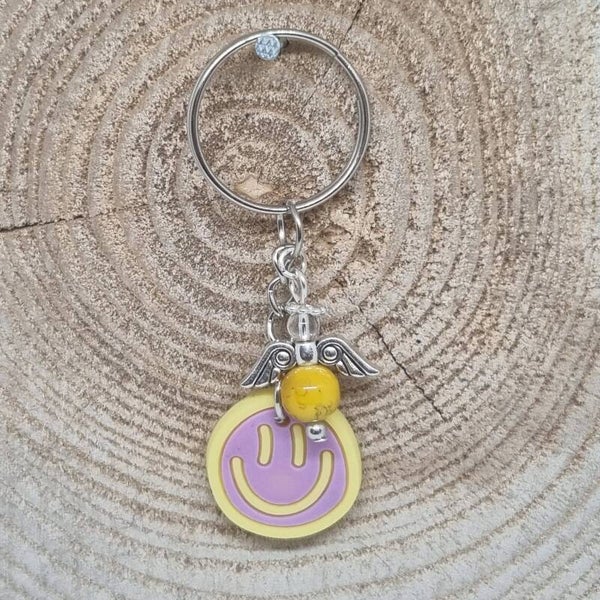 Sleutelhanger smilie paars/geel