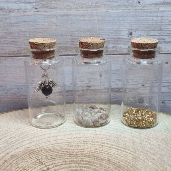 Engeltje in een flesje zwart