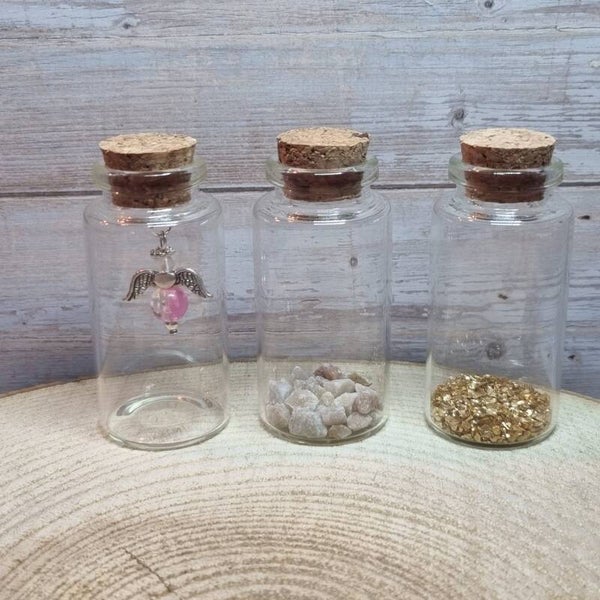 Engeltje in een flesje roze/transparant