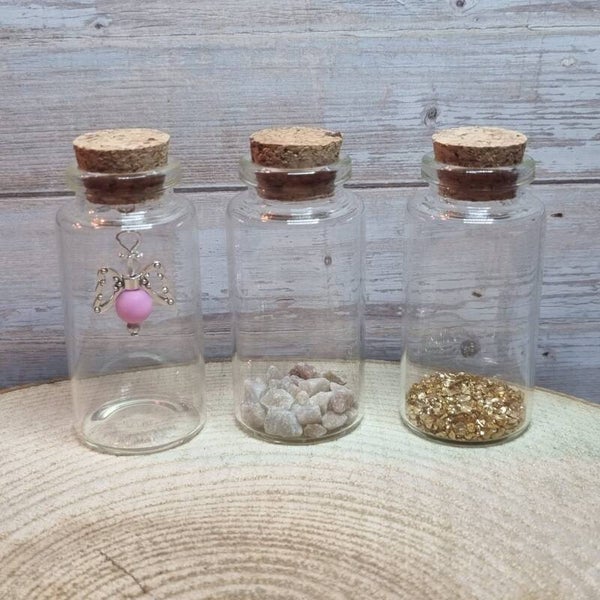 Engeltje in een flesje roze