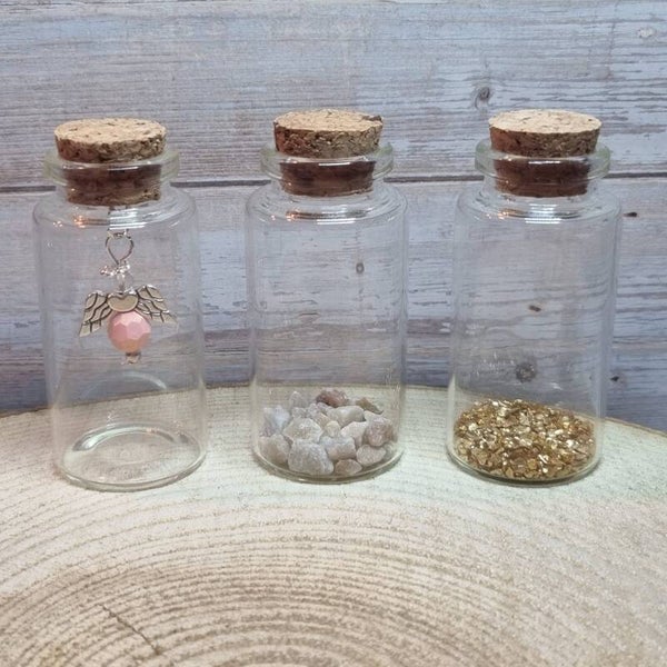 Engeltje in een flesje roze