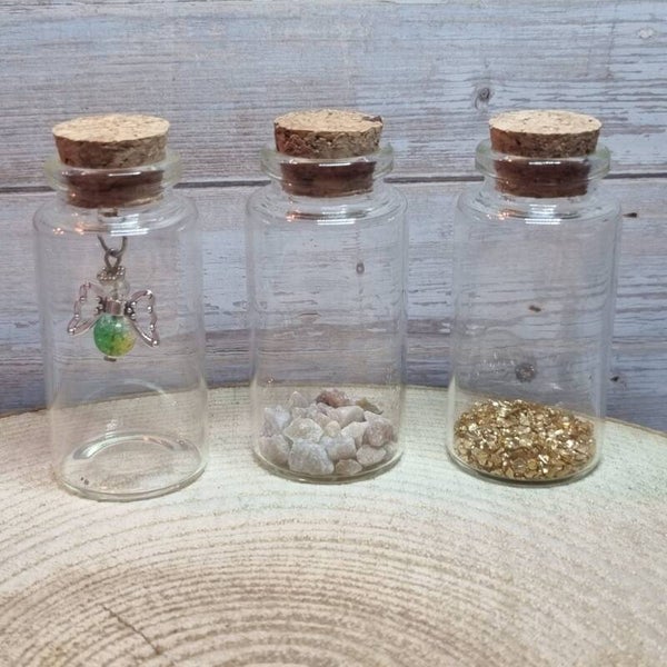 Engeltje in een flesje groen/geel/blauw