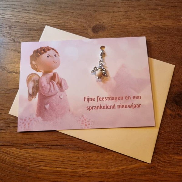 Kerstkaart met kerstgeluksengel crème