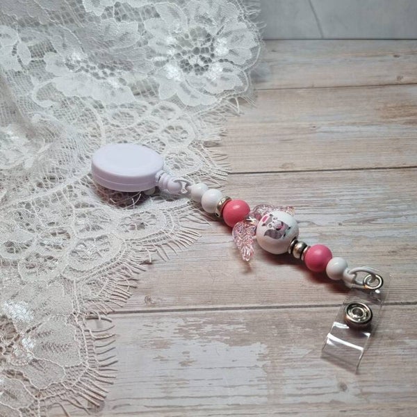 Badgehouder kerst roze/wit