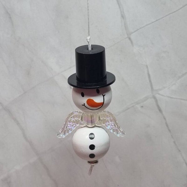 Sneeuwpopgeluksengel knopen buik