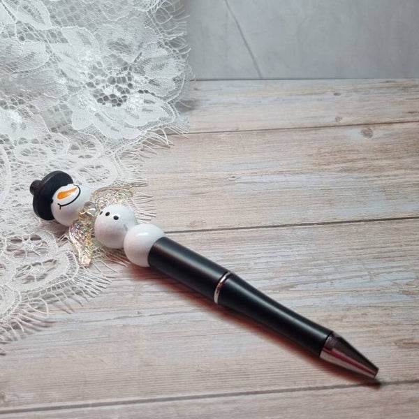 Pen sneeuwpopgeluksengel zwart