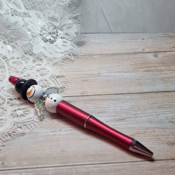 Pen sneeuwpopgeluksengel rood