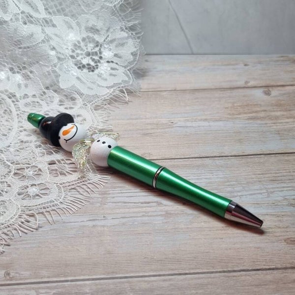 Pen sneeuwpopgeluksengel