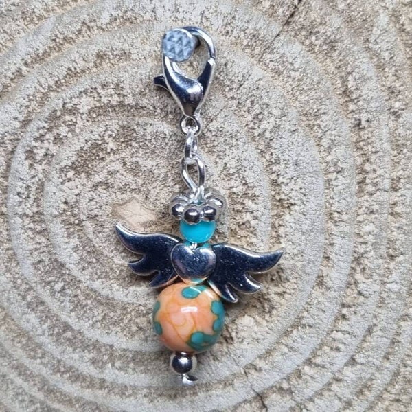 Geluksengeltje oranje/zeegroen