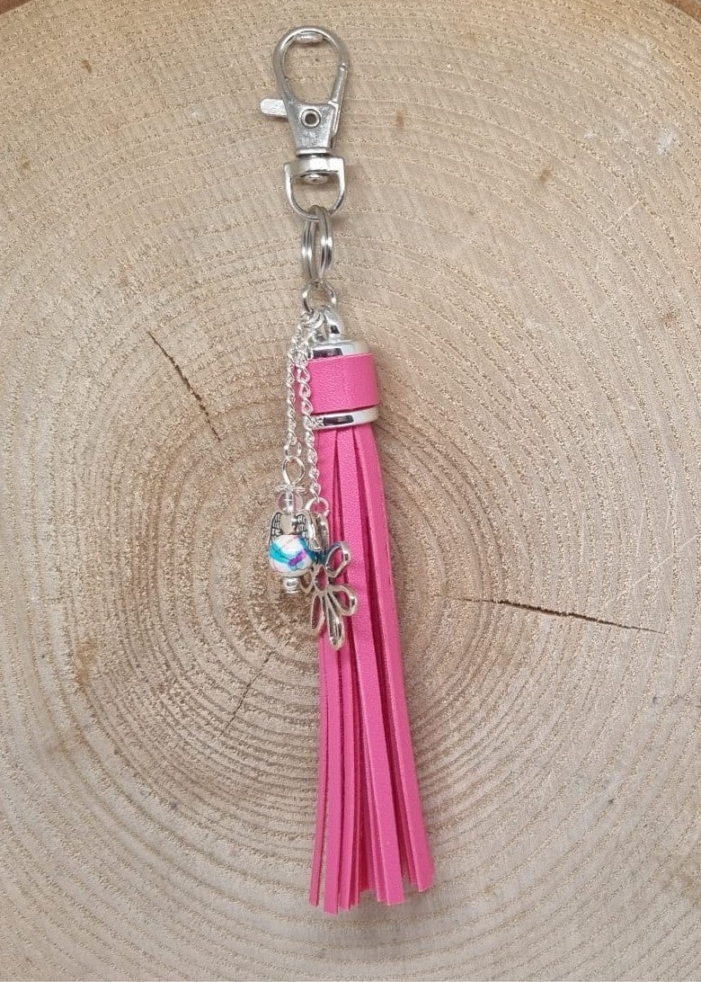 Tassenhanger kwast roze