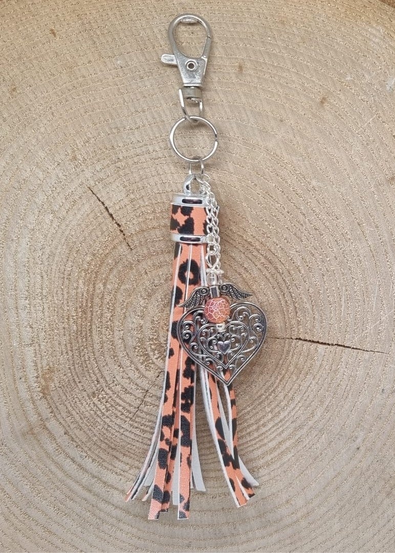 Tassenhanger kwast oranje zwart