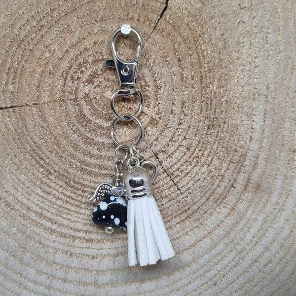 Sleutelhanger suede kwast zwart wit