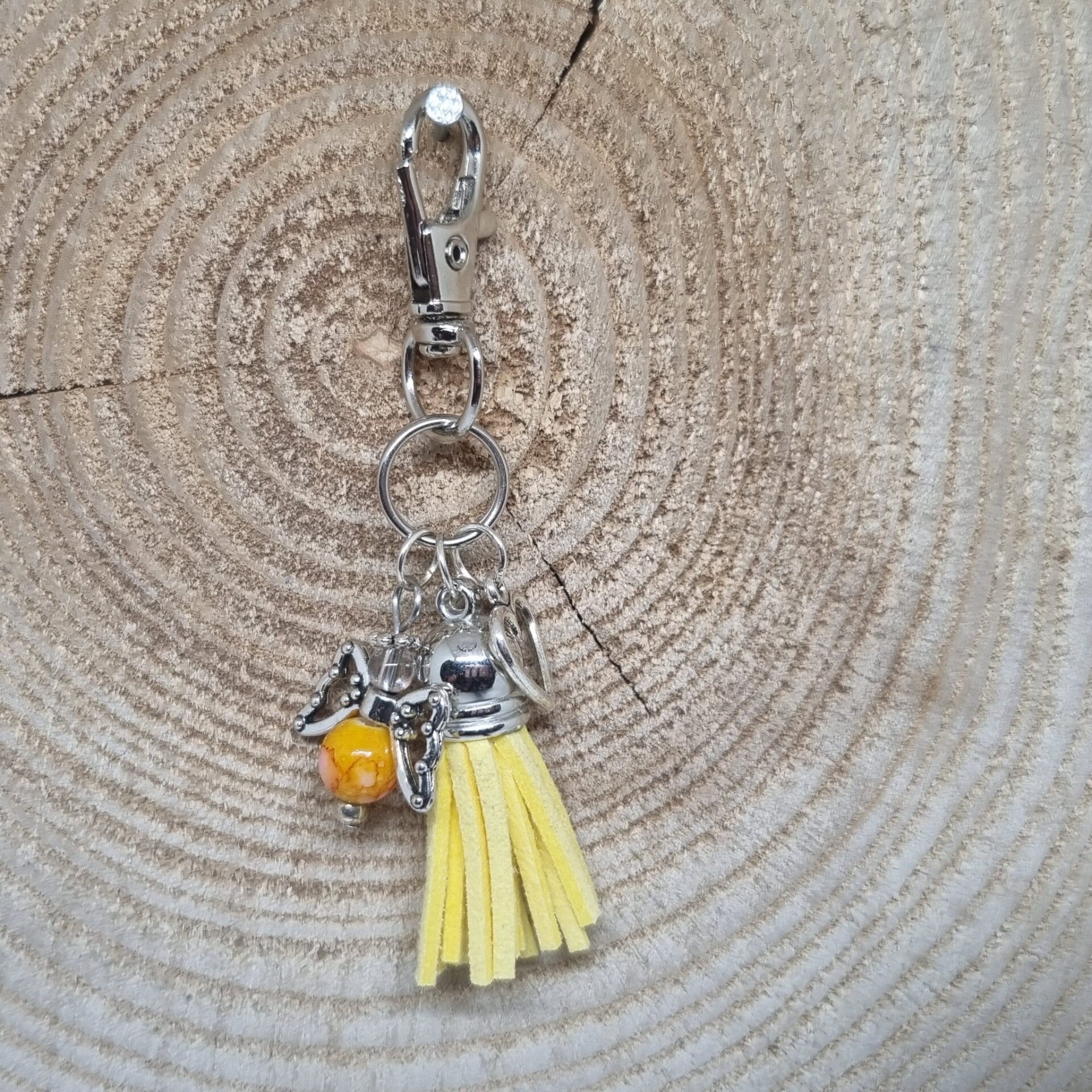 Sleutelhanger suede kwast geel