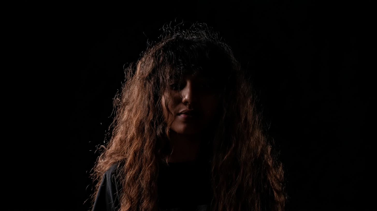 pr1ncesaurus_a_photo_a_person_with_long_curly_hair_backlit_by_7960c817-d13f-4ac6-81d1-5271955440f4_3-1-standard.png