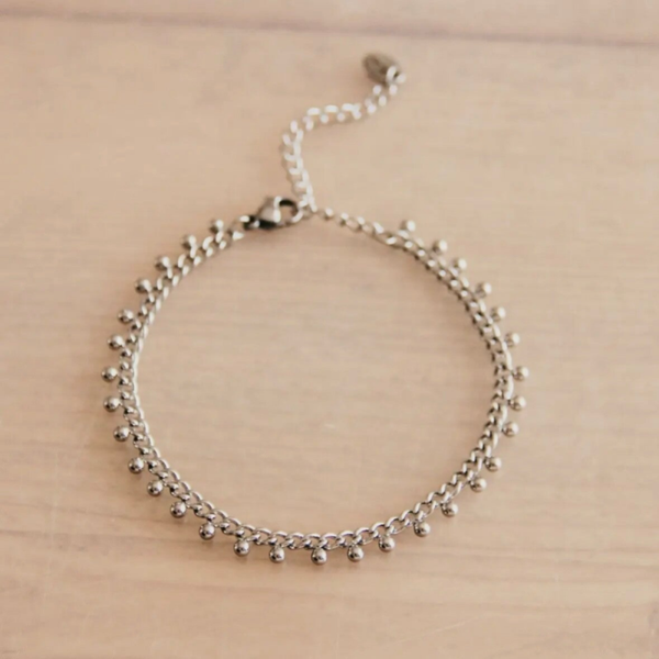 Stalen schakelarmband met balletjes - zilver en goud