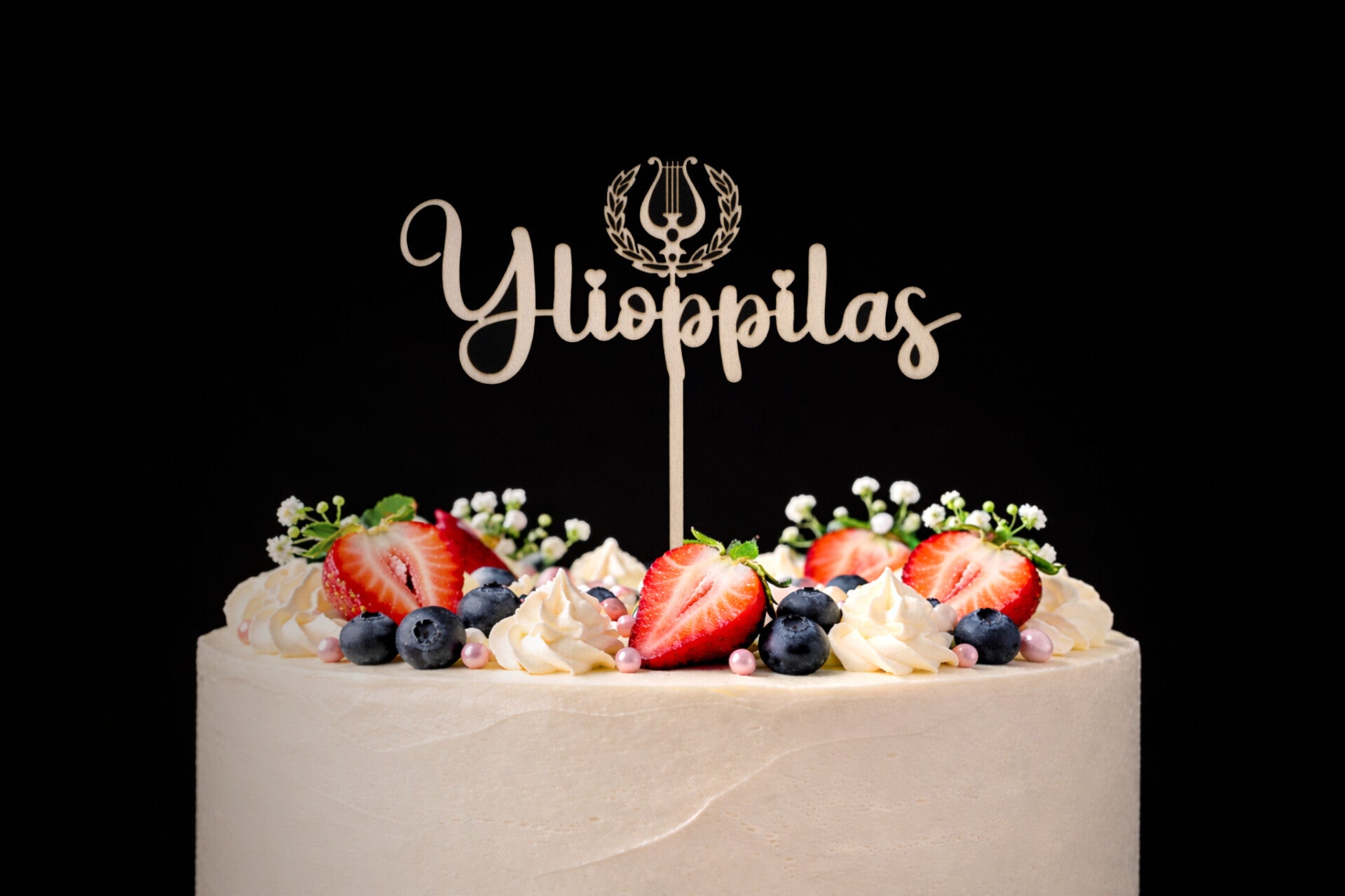 Ylioppilas lyyralla - Kakkukoriste