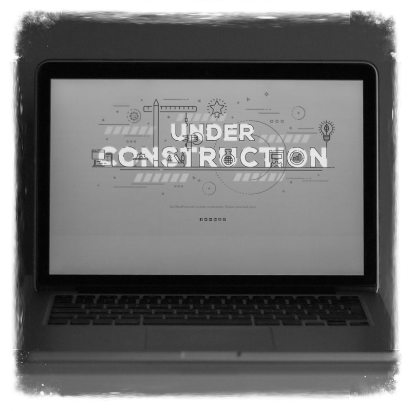 A picture of a laptop with a screen that reads, "Under Construction."