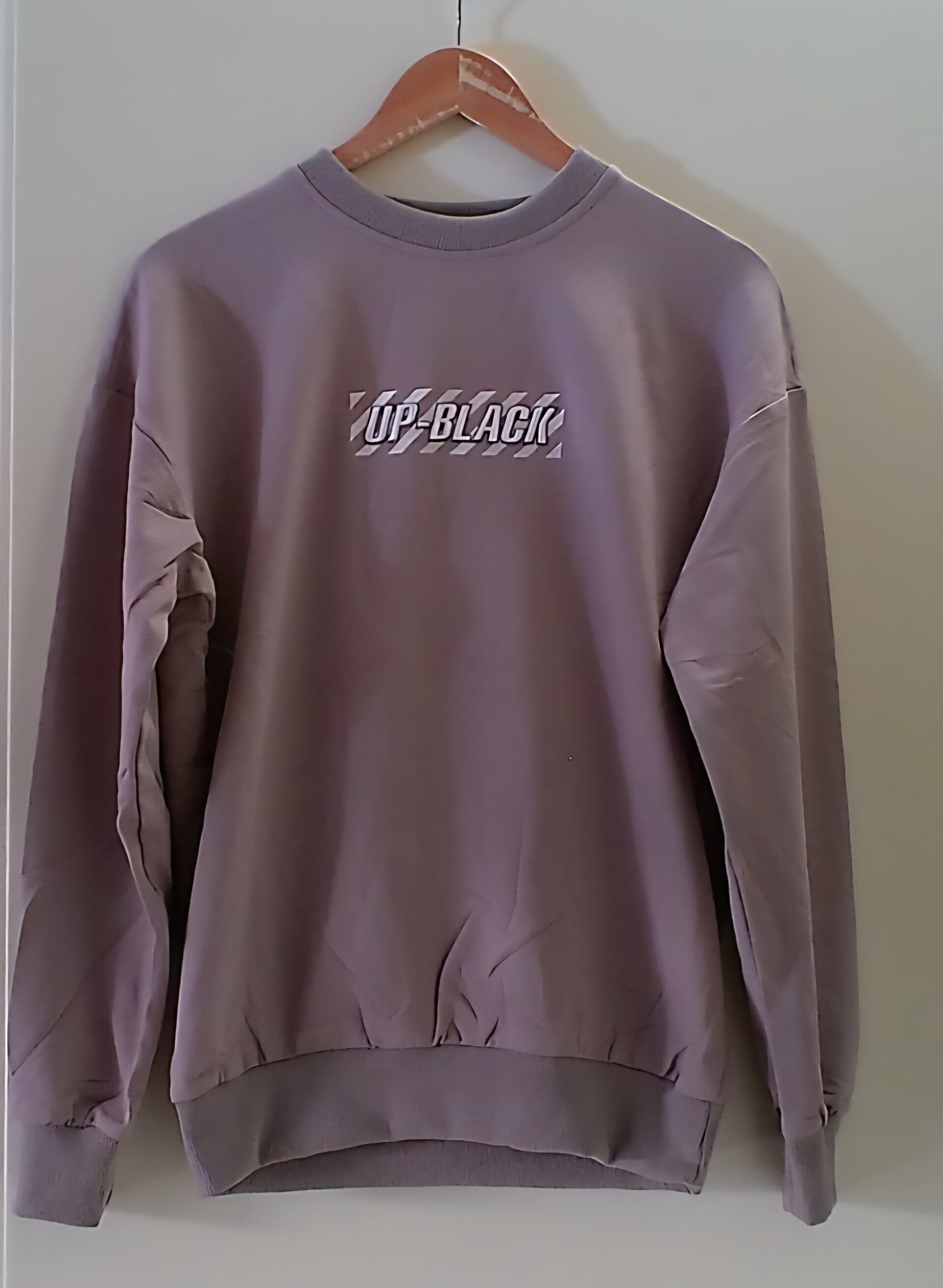 Trainingspak beige pijl