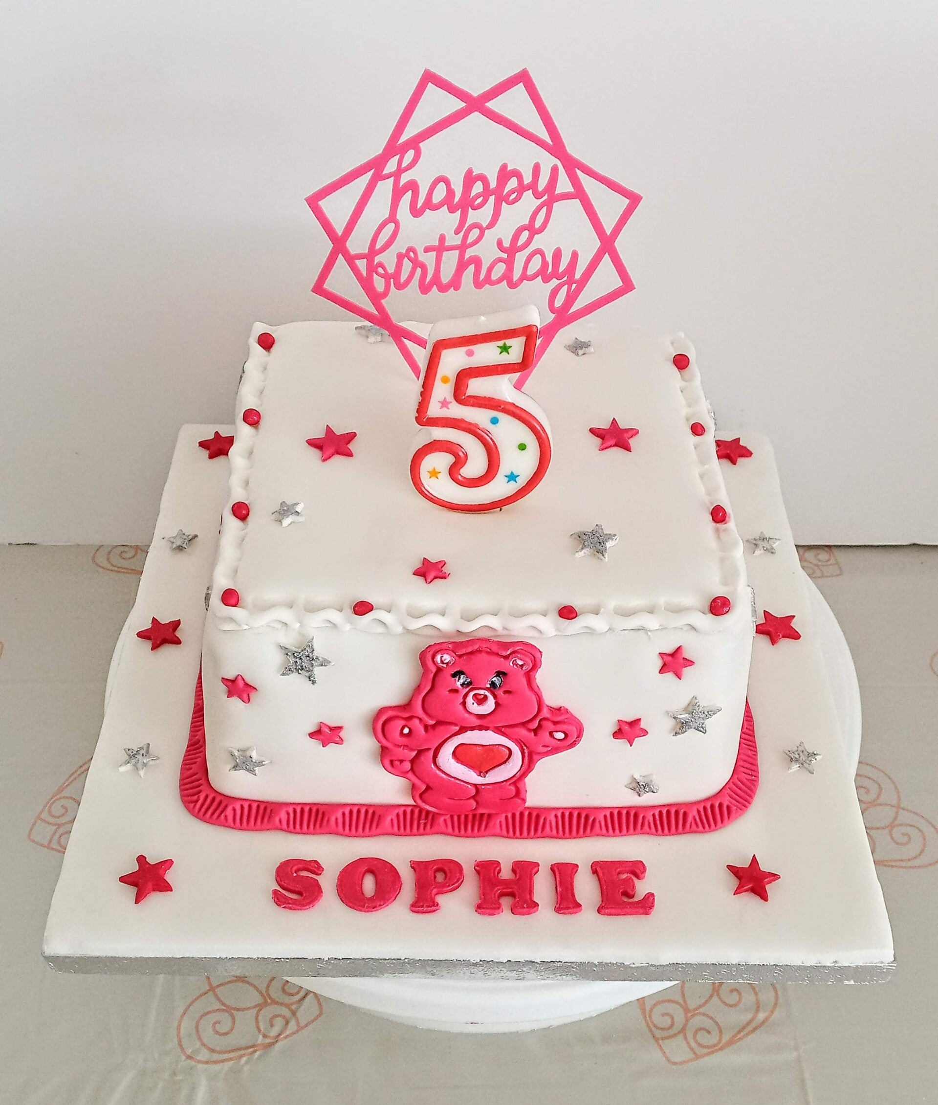 a care bear inspired 5th birthday cake