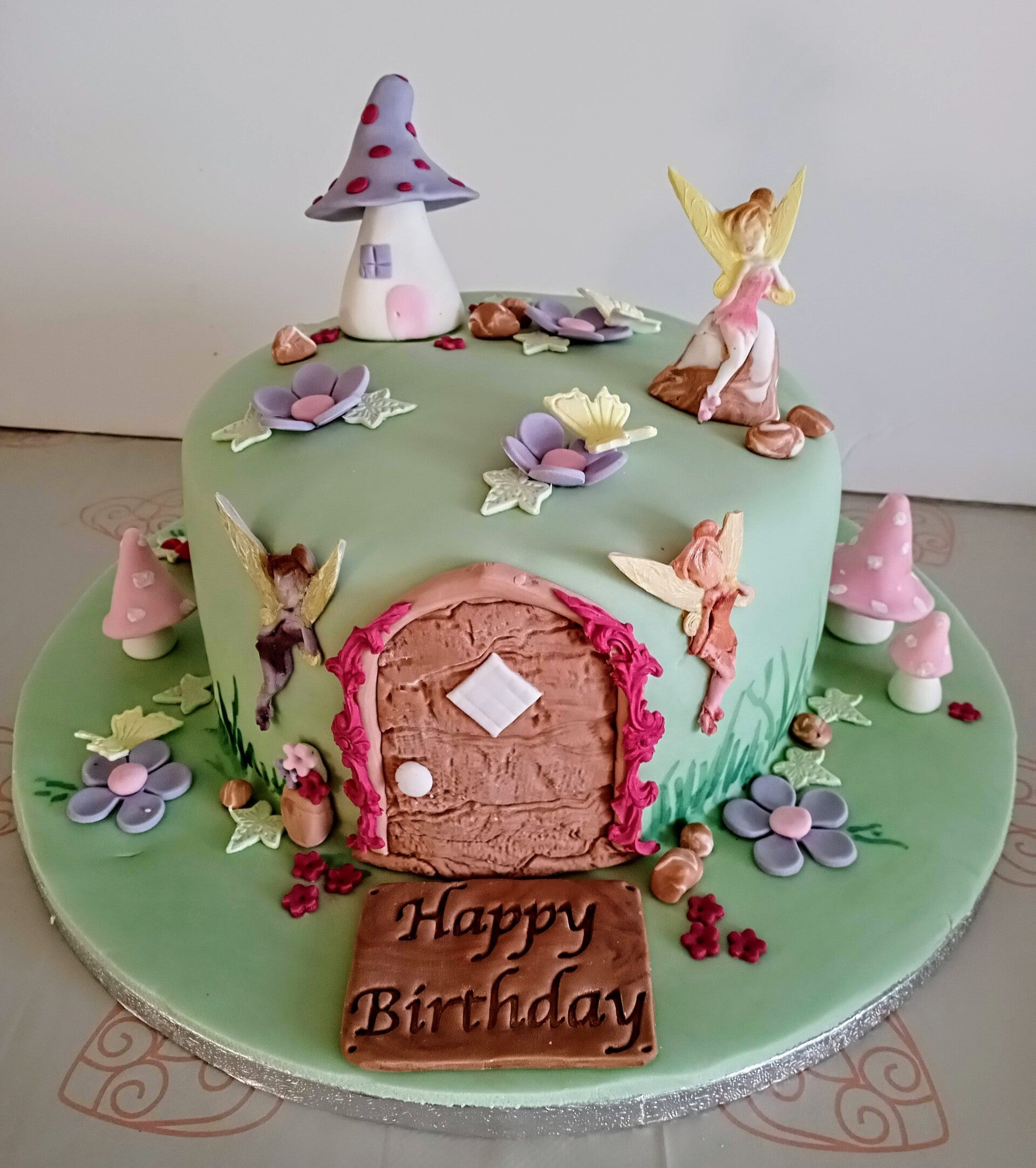 Fairies in the garden themed cake