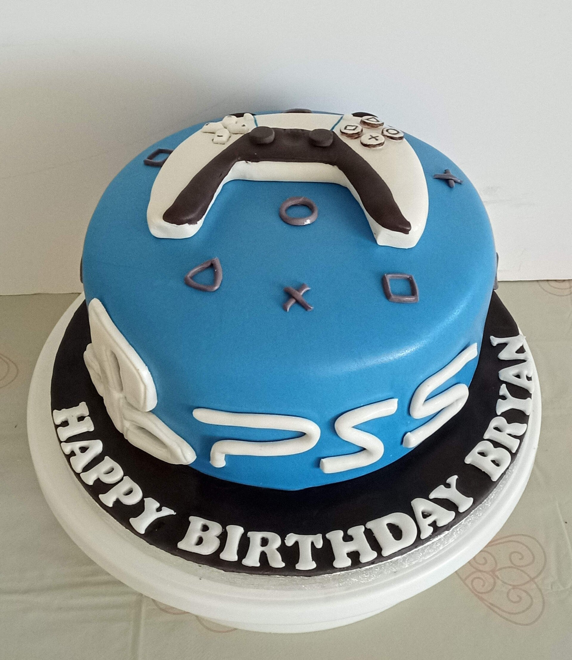 Playstation themed boy birthday cake