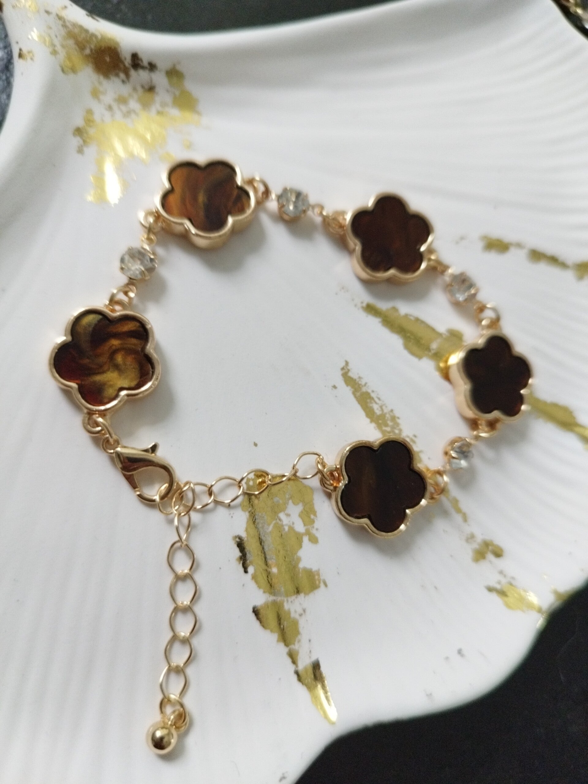 Bracelet fleurs métal doré brun doré