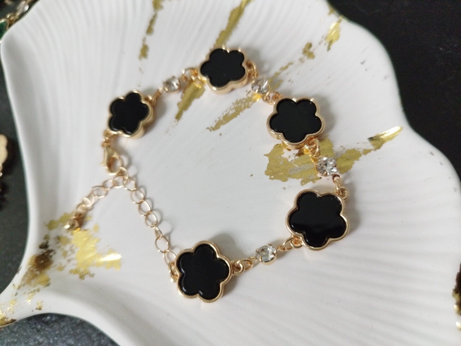 Bracelet fleurs métal doré noir