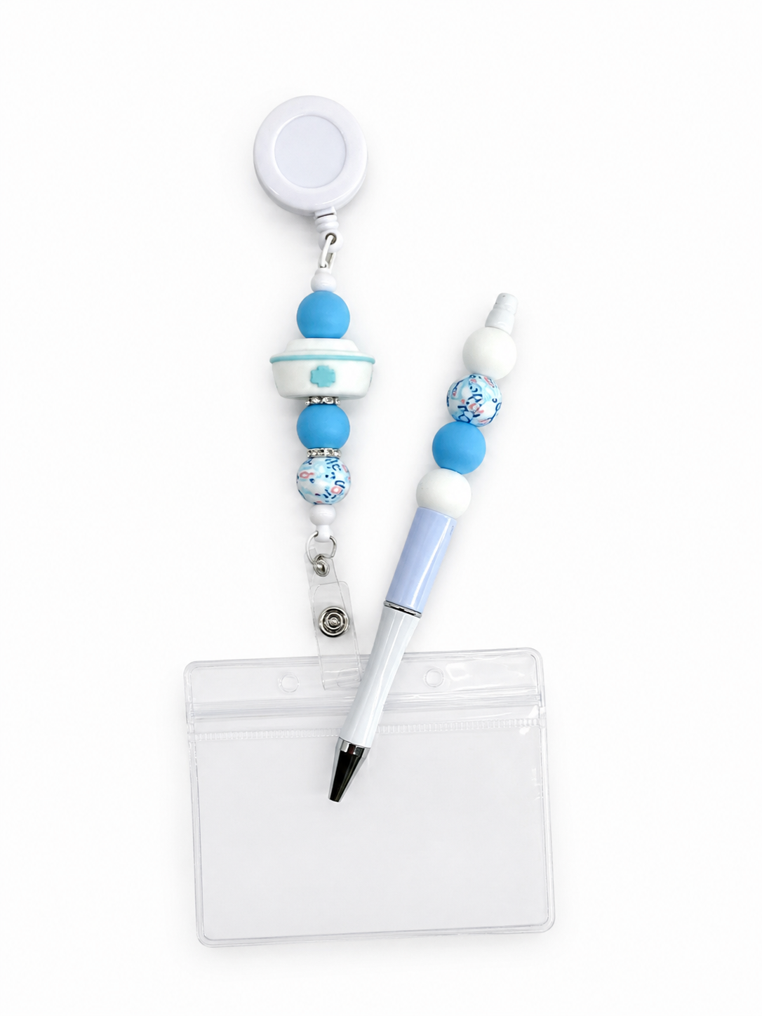 Naambadgehouder zuster  + pen en klein notitiboekje