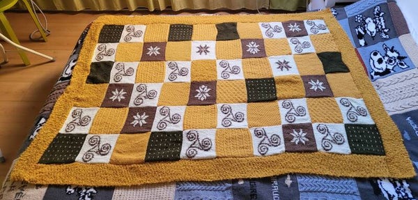 Plaid réalisé avec des fils de textures différentes