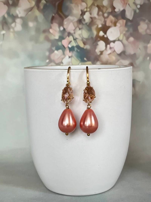 Roze kristalglas en roze glasparel