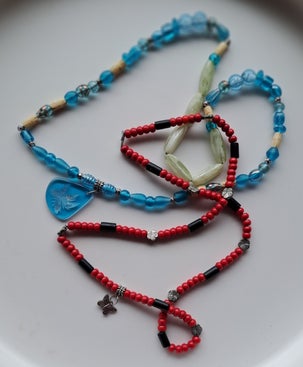 combinatie van glas, been en metaal