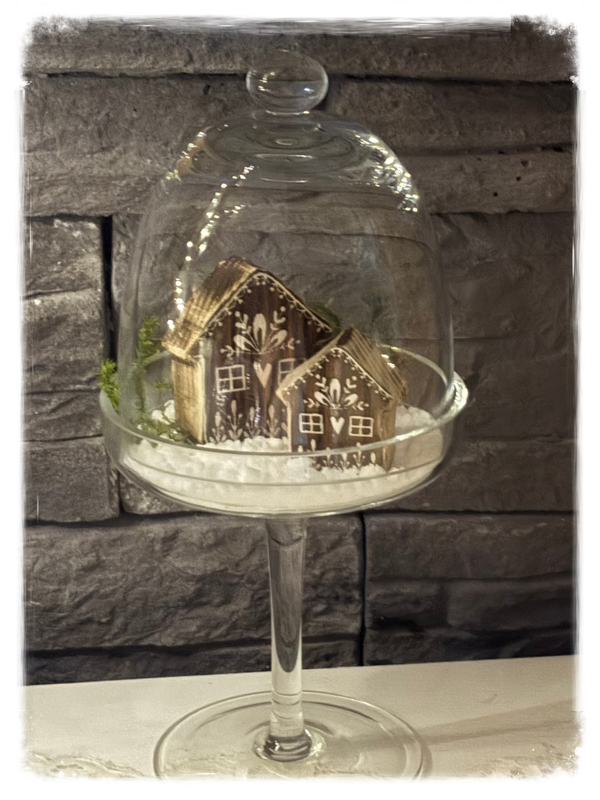 Maisons de bois sous cloche de verre