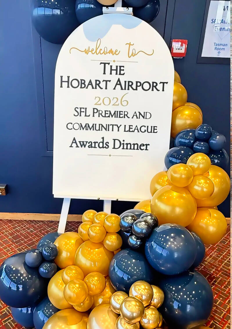 Custom welcome sign with navy and gold balloon garland for the Hobart Airport SFL Awards Dinner