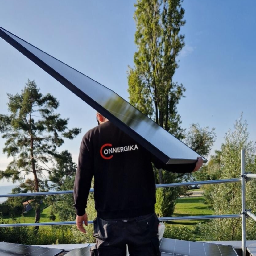 Image entreprise Onnergika Sàrl pull brodé par nos soins.