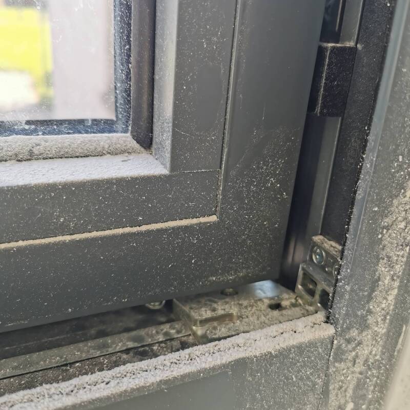 Saw dust on window frame