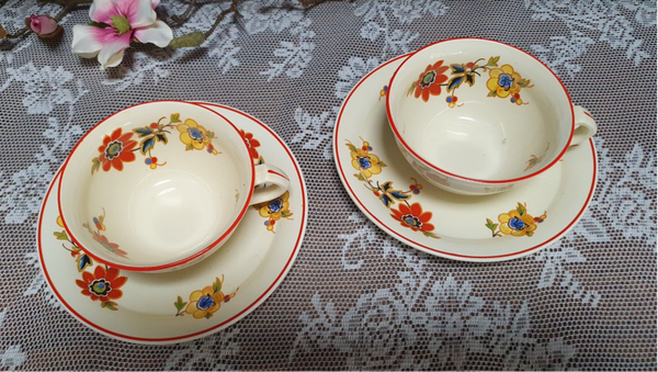 Kop & Schotel - Société Céramique Maastricht - Decor 7180 Oranje/ gele bloemen