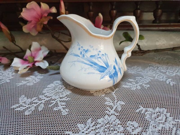 Melkkan - Petrus Regout - blauw plant/bloem belletjes