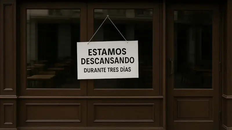 Puerta de un restaurante con un cartel que dice: estamos descansando durante tres días