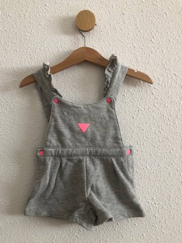 Salopette met een Gezichtje