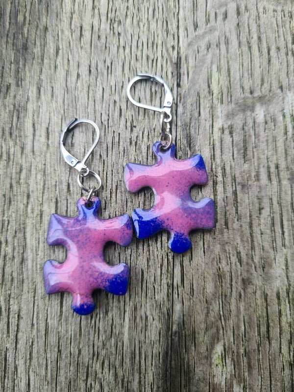 Geëmailleerde puzzelstukjes