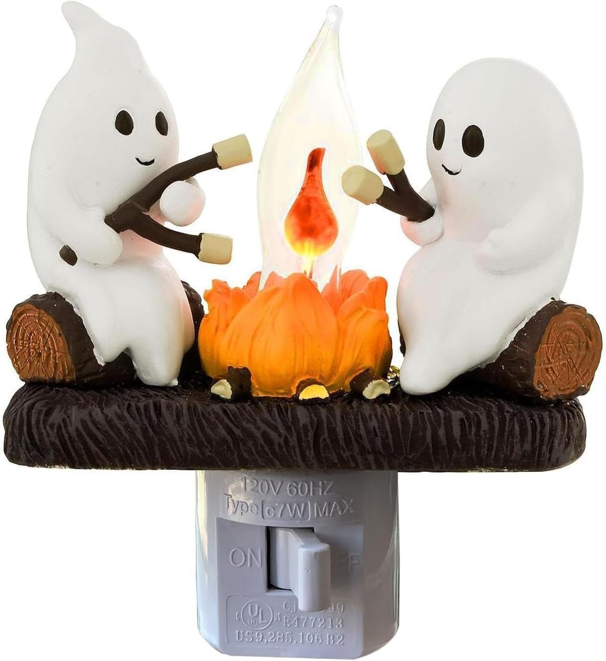 A cute white ghost sitting beside a flickering campfire nightlight with warm glowing flames, perfect for Halloween or fall décor.