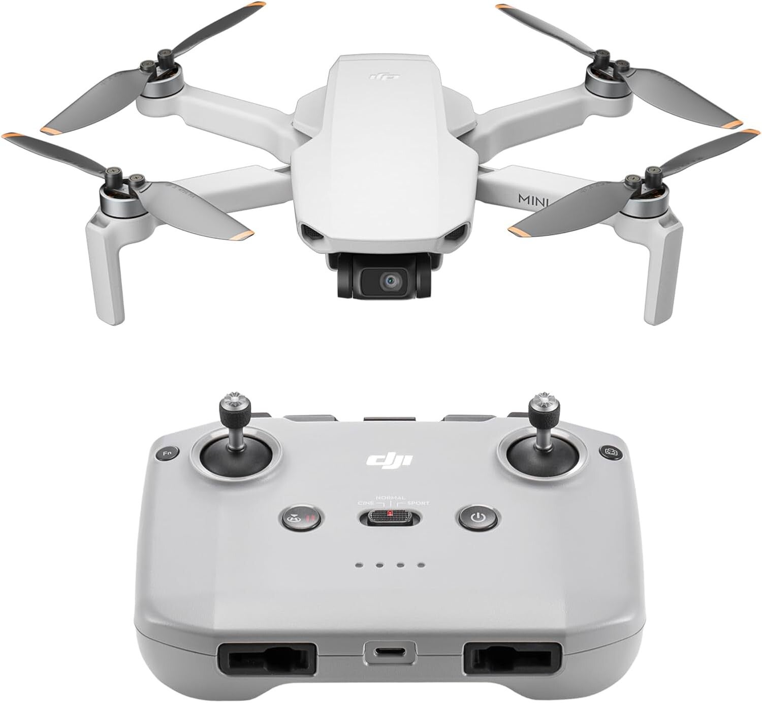 .Compact DJI Mini 4K Drone with remote controller, battery, and accessories displayed on a table; designed for beginner drone users and content creators.
