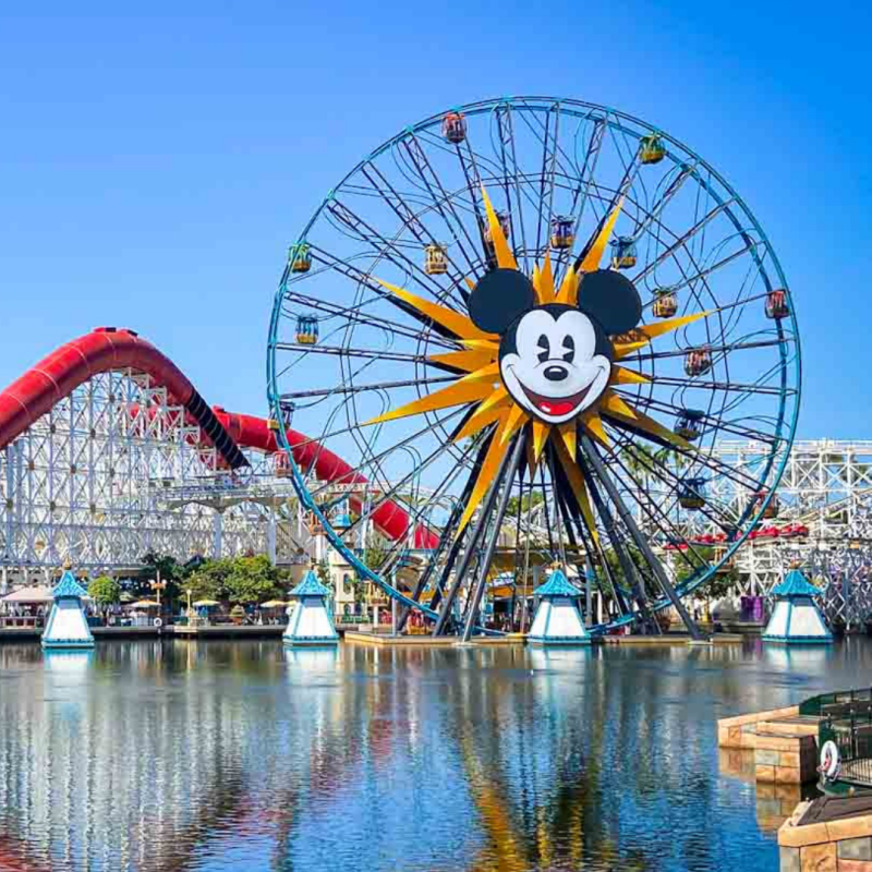 Ferris wheel at Disney California Adventure glowing at sunset, capturing the magic of a Disney family vacation.