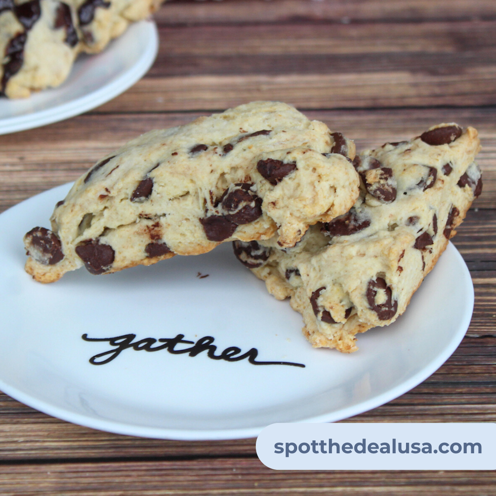 A golden, bakery-style jumbo chocolate chip scone on a plate