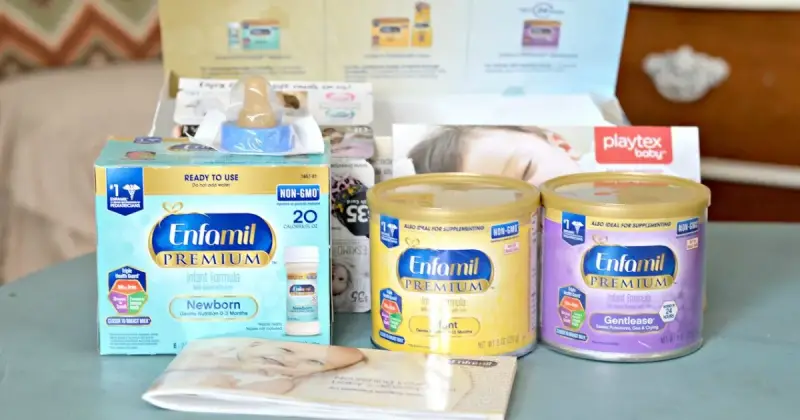 Enfamil Family Beginnings free baby welcome box with formula and coupons, styled with baby-themed packaging