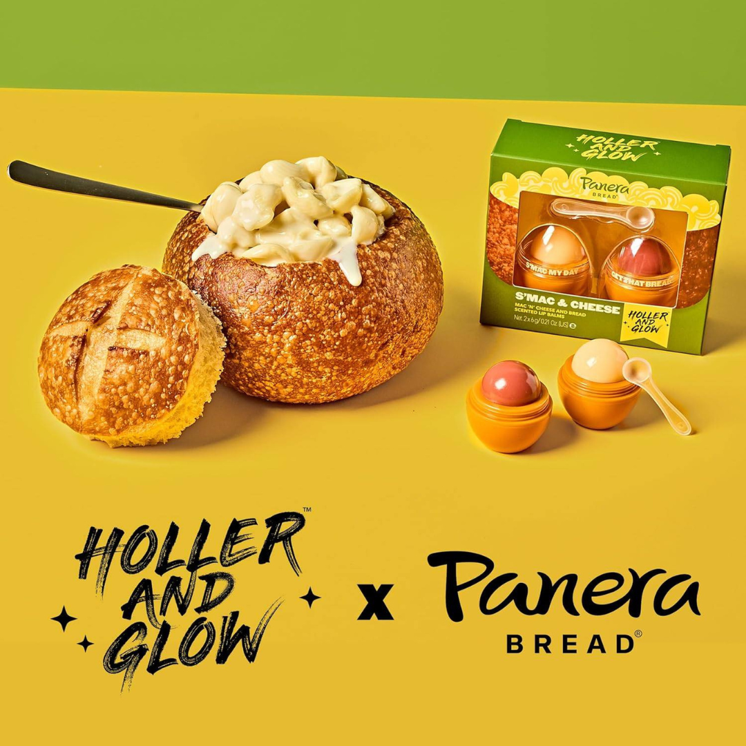 Two lip balm tubes labeled Mac N Cheese and Bread, part of the Panera x Holler and Glow Lip Balm Duo, photographed in fun packaging.