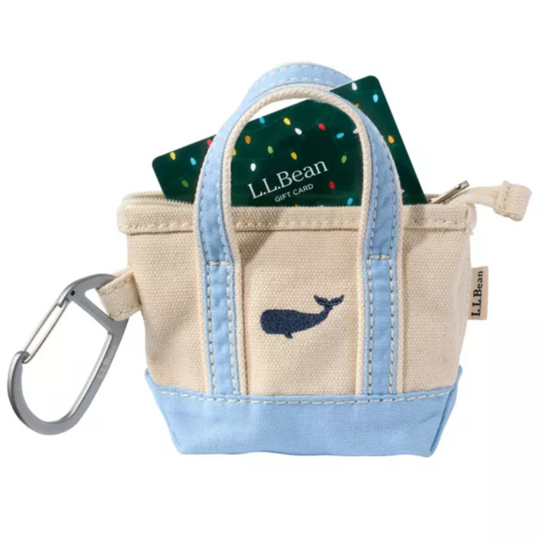 L.L.Bean Embroidered Micro Tote Bag featuring a blue whale embroidery design on durable natural canvas with navy trim, inspired by classic coastal New England style.