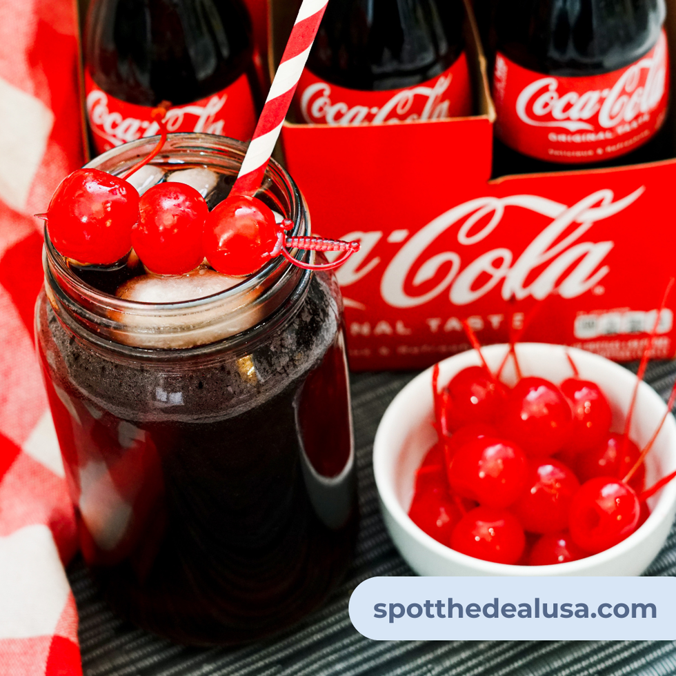 Roy Rogers mocktail in a glass with ice, cola, grenadine, and cherry garnish
