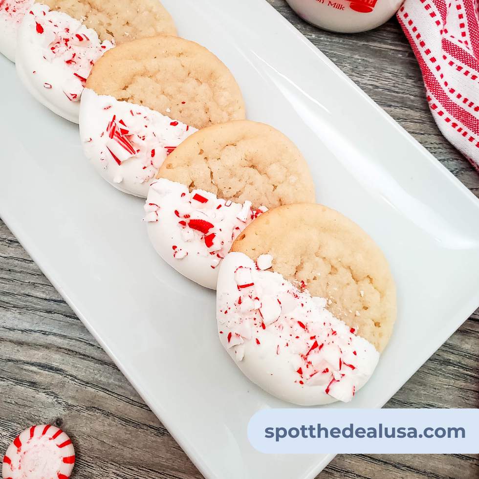 Sugar cookies dipped in white chocolate and topped with crushed peppermint candy