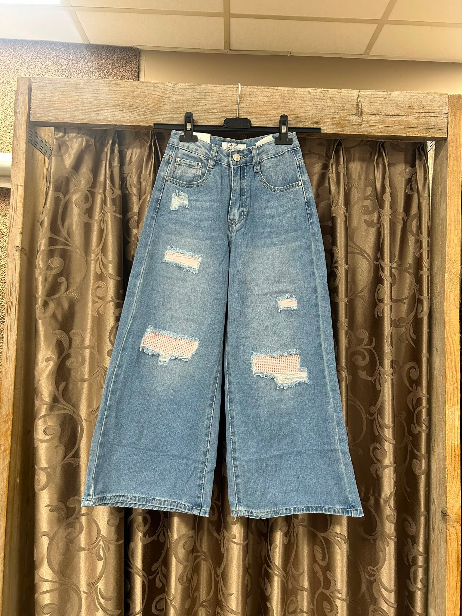 Meisjes spijkerbroek blauw met roze glitter zak